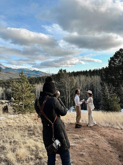 Denver elopement photographer photographs couple's exchange of vows during Pike's Peak elopement.