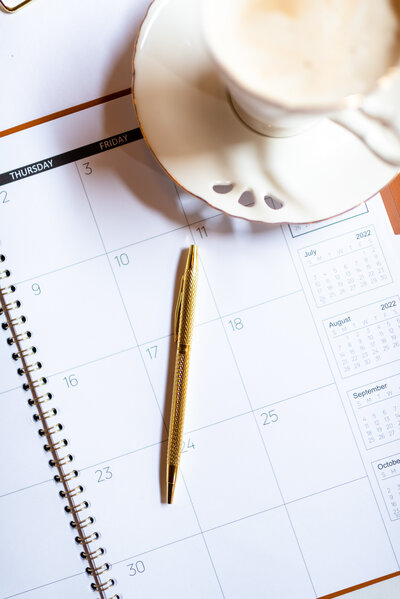 calendar planner and gold pen