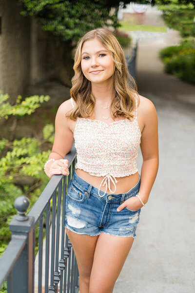 Teen in summer clothing getting senior portrait in Glasgow, KY