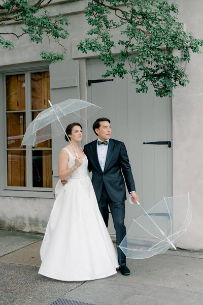 Happy Couple at Outdoor Garden Ceremony Altar Pops of colorful florals and bride with a ruffle dress