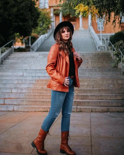 Portrait of Mewphotovideo founder Morgan standing in urban setting – personal brand photo for creative entrepreneur