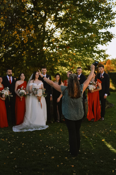 woman smiling taking a photo