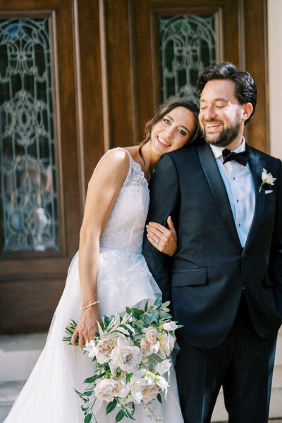 Bride and groom walk up memorial steps at their DC wedding