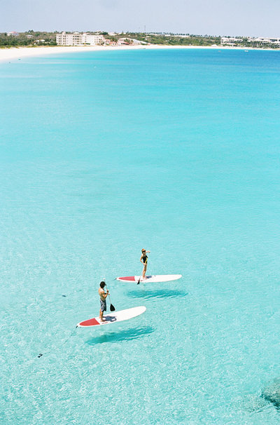 couple standup paddleboarding in anguilla