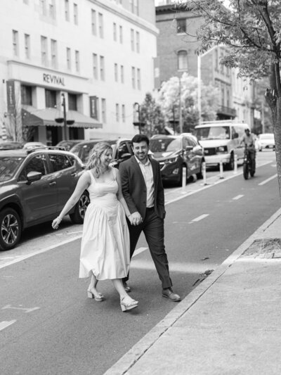 couple looking and smiling out in the distance, taken by one of the top wedding photographers in Baltimore, MD