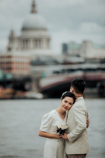 romantic-image-of-couple-posing-for-London-elopement-photographer-st-paul's-cathedral-1518-Hadi Photography