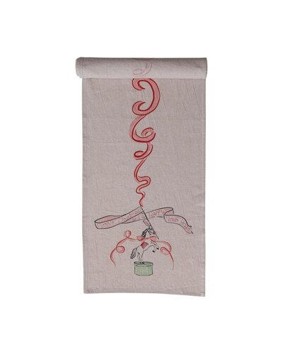 Neutral-toned holiday table runner featuring a red ribbon and bell illustration.