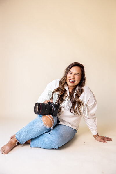 Brand photo of Madison sitting on the ground — Madison Abernathy Photo