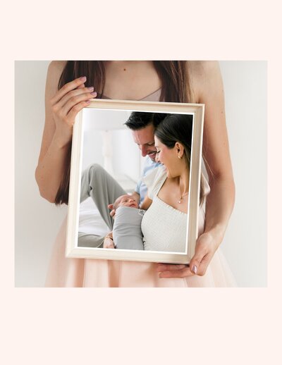 Mom and dad holding their newborn and young son – Columbia SC family photography.
