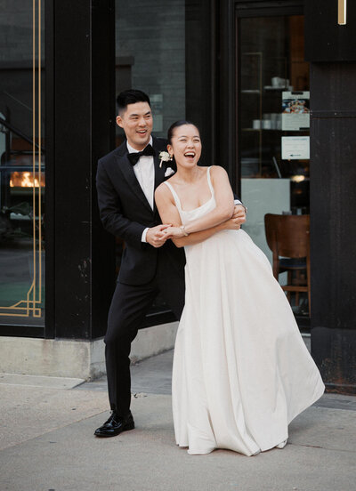 Bride and groom walk up memorial steps at their DC wedding