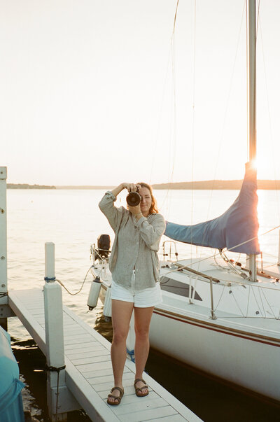 Photographer headshots on sailboat. Houston Texas documentary digital and film photographer