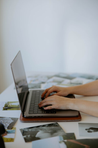 photographer working on computer 