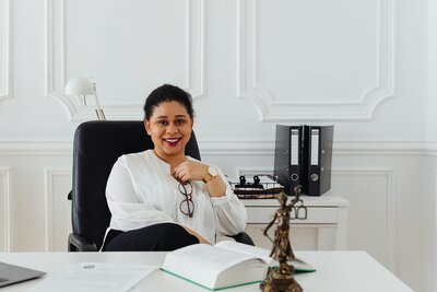 Woman smiling at her desk