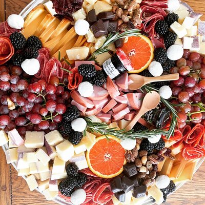 The Grateful Gourmet Grazing Board custom to any event that you purchase with the grateful gourmet. Fresh local ingredients, farm to table, locally owned. Family fun.   