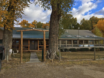 Hanging Bull lodge entrance in Encampment WY