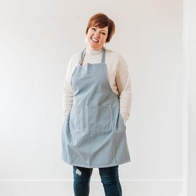 Mama Lisa in one of her favorite aprons.  Doing her favorite thing, baking