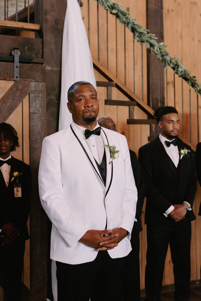 A bride and groom have a dance outside of their churh