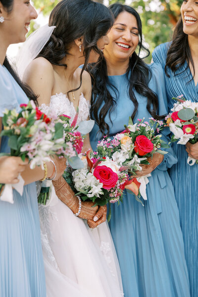 Bridal dress hangs in the courtyard at Wolf Lakes Park wedding