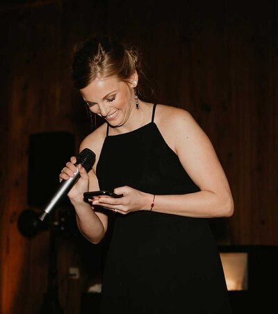 Ashlyn Justice Jacksonville Corporate Event Planner Making Announcements