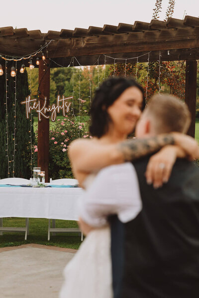 LGBTQ couple during first dance Yakima Arboretum