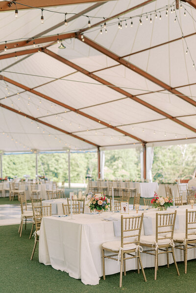 Rustic indoor wedding reception at The Brightside, featuring exposed brick and string lights.