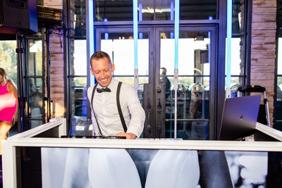 Jerry Humes DJing a wedding at Bella Amore in July with loren jackson photography