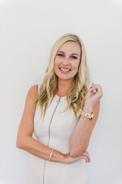 Natasha Kozlowski, luxury wedding planner in Austin and New Orleans, wearing white dress