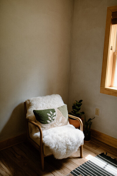 Chair in a corner at Alyn Wellness Studio