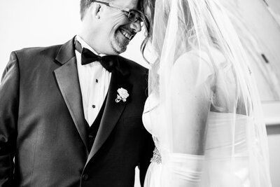 groom & bride smiling