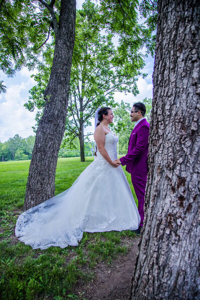 couple holds hands at wedding phoenix