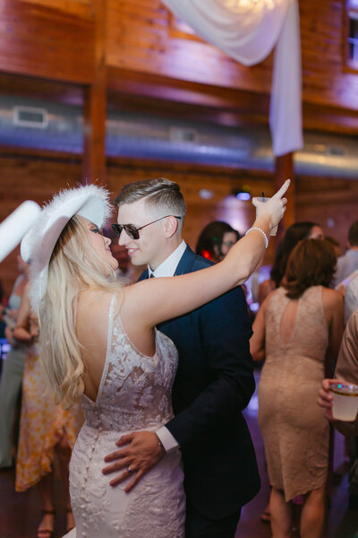 bride and groom dancing at reception