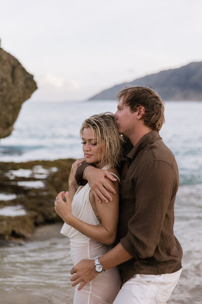 couples portraits in wildflower field
