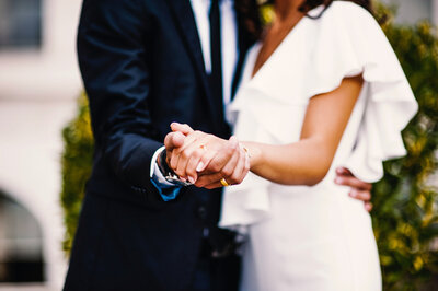 Couple holding hands