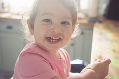 little girl smiling knoxville tennessee newborn photographer
