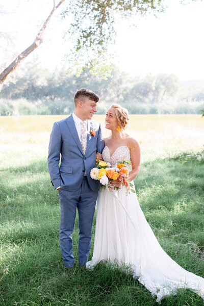 Gorgeous bride and groom embrace on their wedding day at Belmond El Encanto