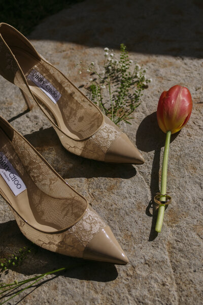 Regan's wedding details: shoes, rings, and florals.