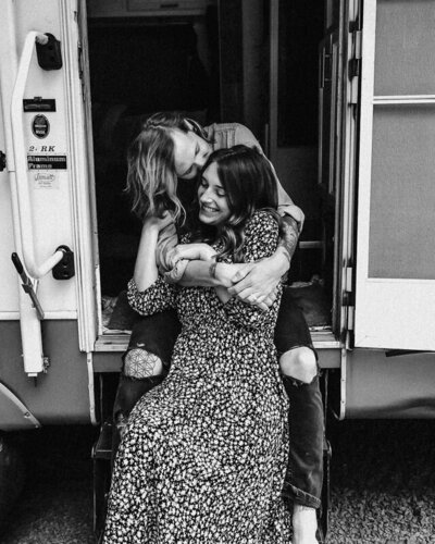 washington elopement photographers,  Sam and Kyle snuggle in the doorstep of their RV