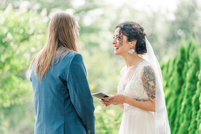 Couples shares a dip in the gardens during their charlotte nc engagement session