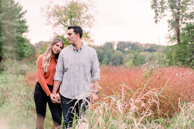 Couple embraces at an engagement session in Rocky River Ohio