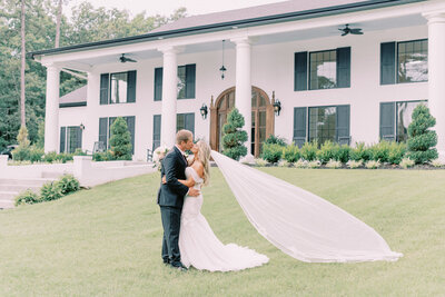Bride and Groom at Houston's Venue - Epic Wedding Pictures - Flying Veil Photography Shot