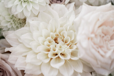 Elegant white dahlia flowers styled for a wedding.