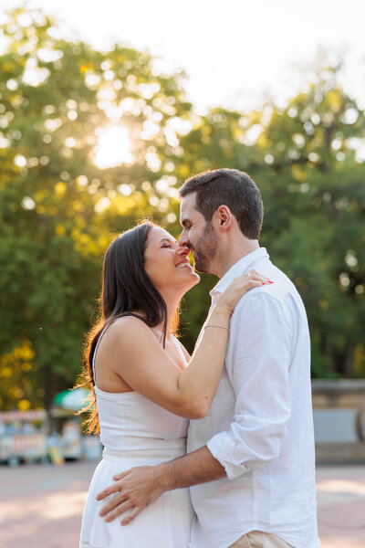 Bride leading groom engagement shoot