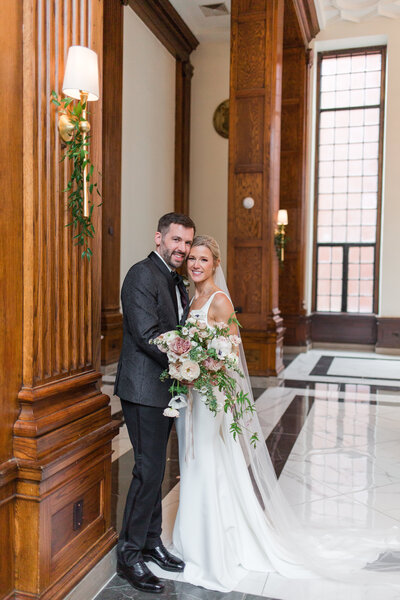 Bride and groom walk up memorial steps at their DC wedding
