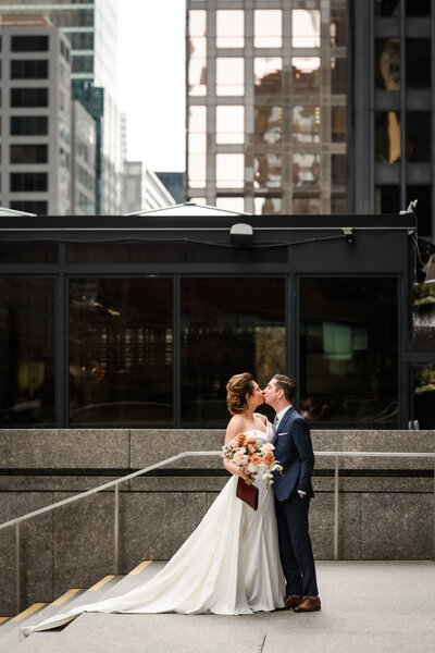 photo of bride looking at groom during speeches on wedding day