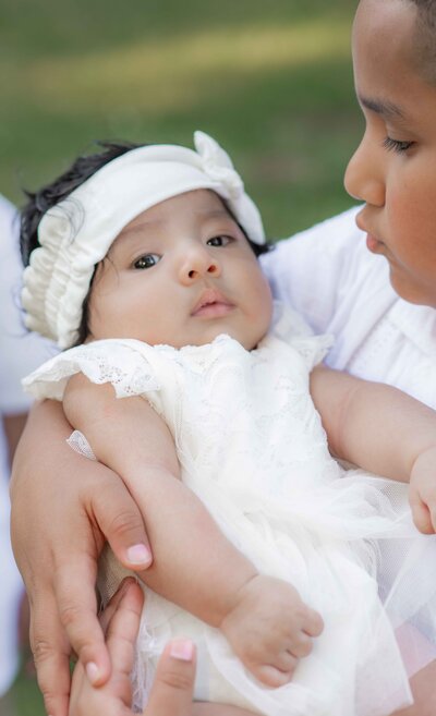 A baby photographed in a family photo shoot in Lacamas WA