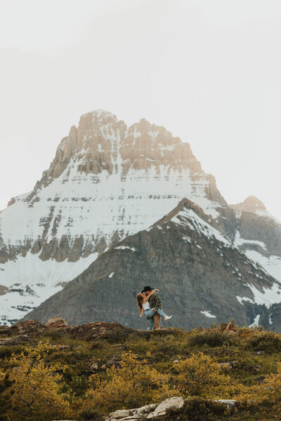 Couple kissing in the mountains