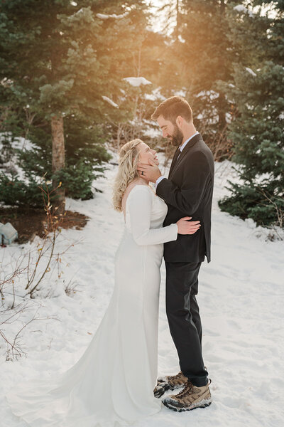 A couple walks in the snow on Cottonwood Pass