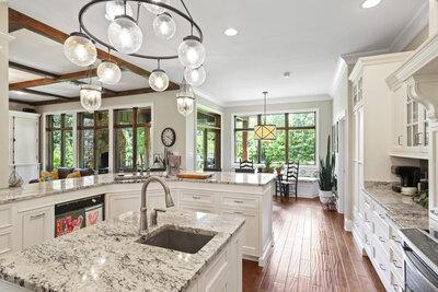kitchen with glass chandelier and granite counter tops