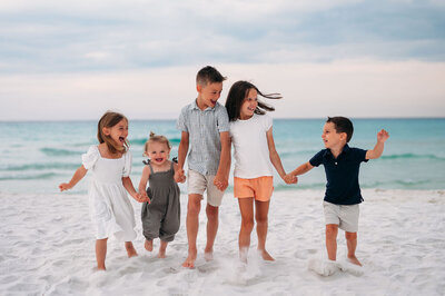 Family Posing on the beach on destin florida