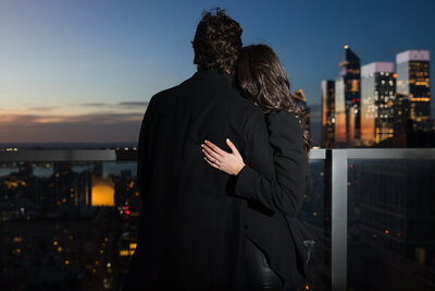 couple-embracing-closely-enjoying-their-city-view.